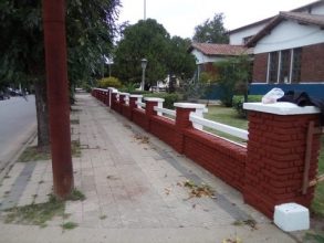Pintura y mejora del cerco perimetral en Obras Sanitarias